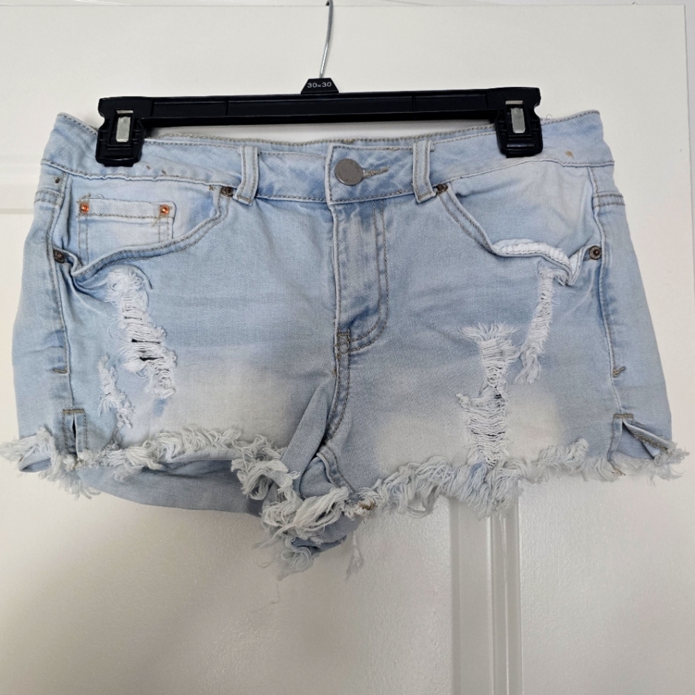 Distressed light wash denim shorts